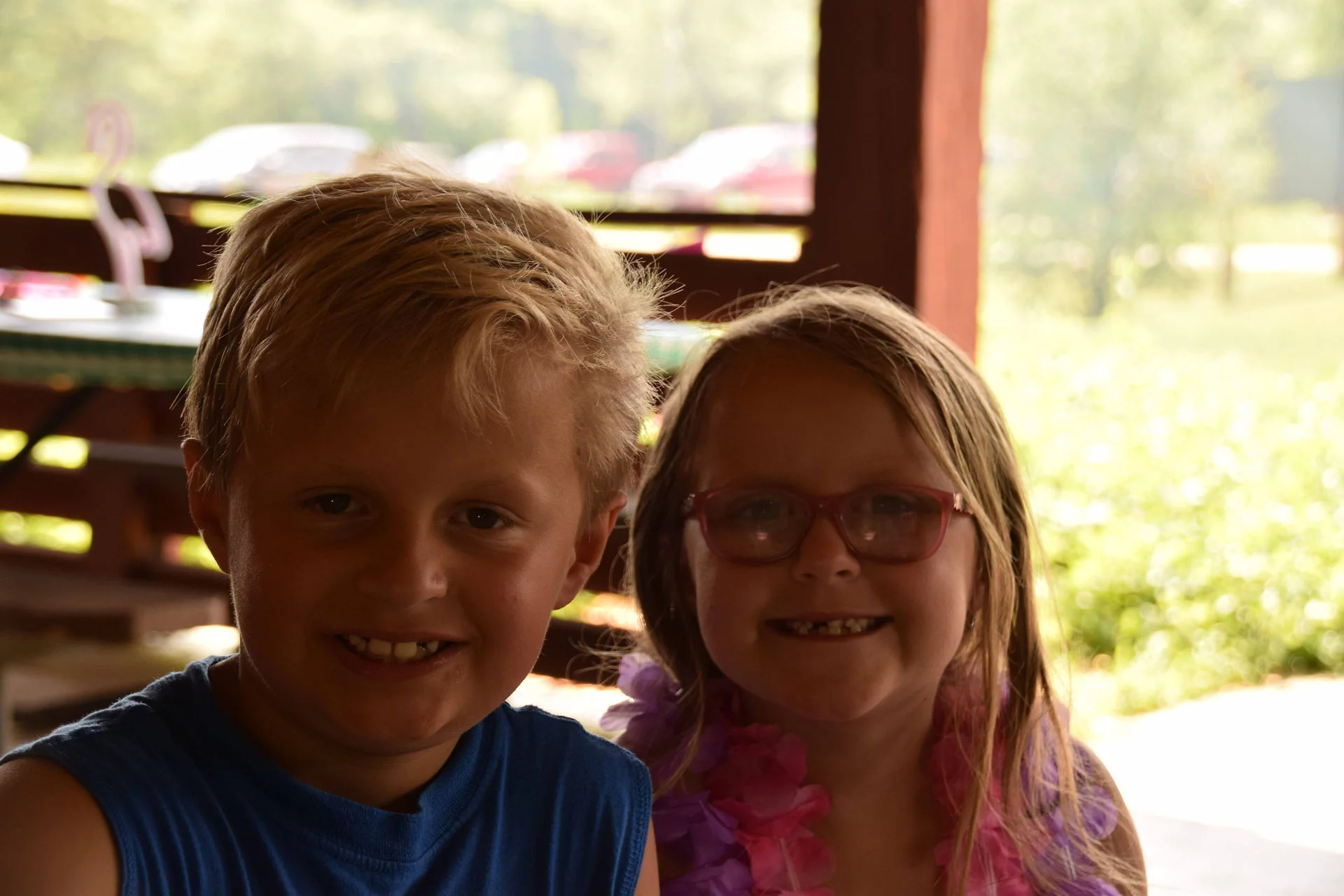 Photos of food, happenings, staff and family during the company picnic event