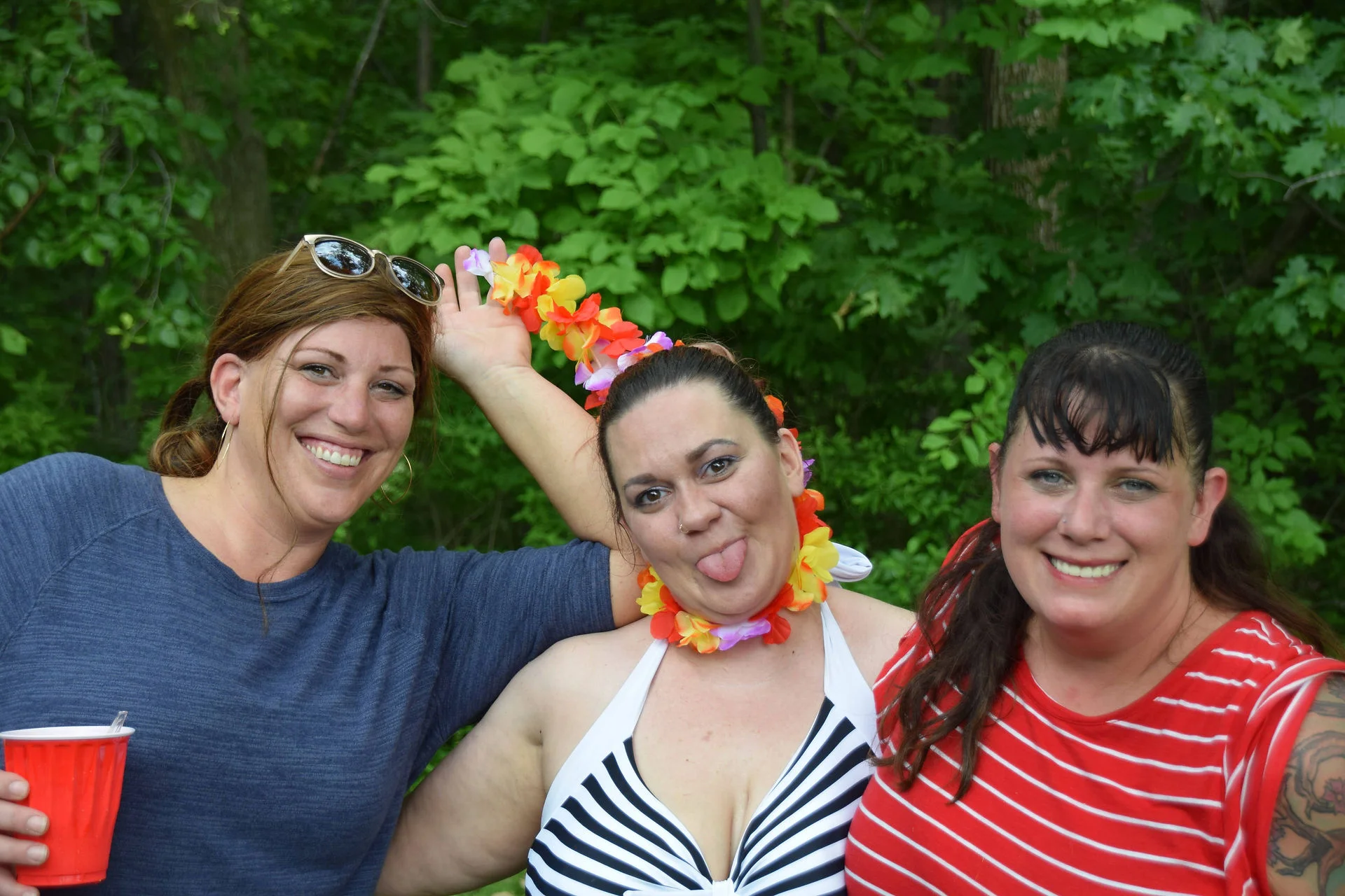 Photos of food, happenings, staff and family during the company picnic event