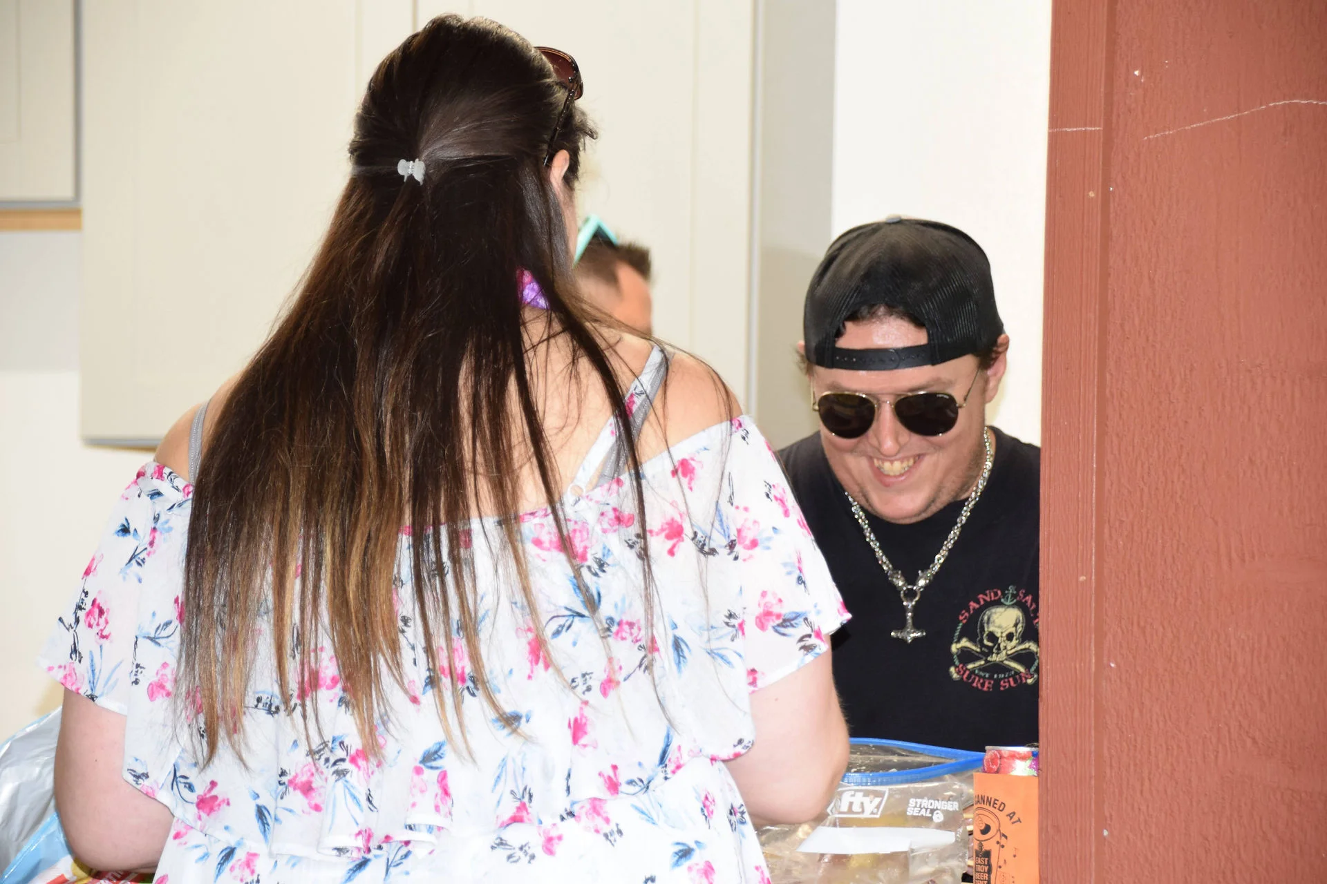 Photos of food, happenings, staff and family during the company picnic event