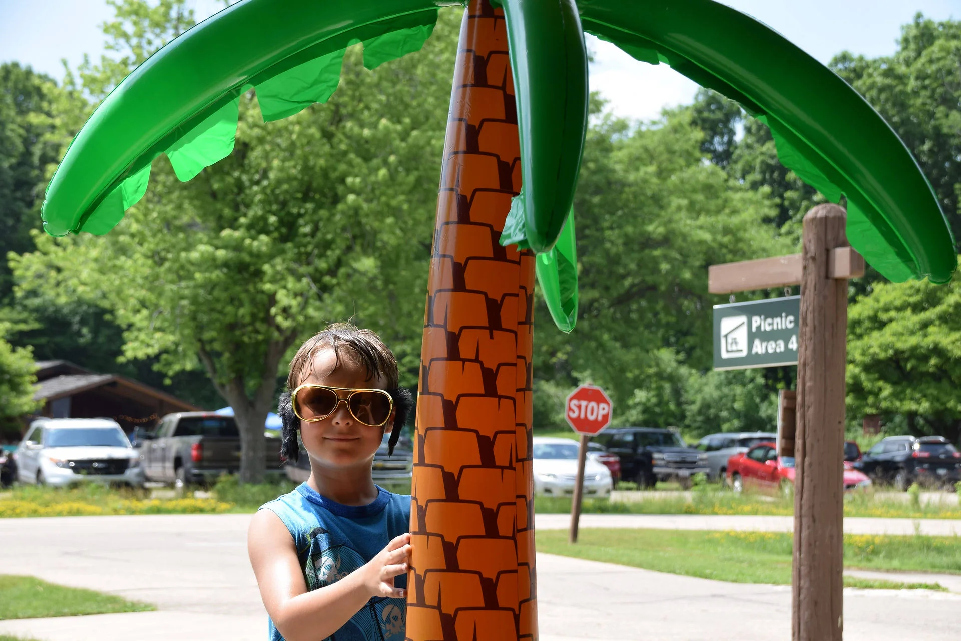 Photos of food, happenings, staff and family during the company picnic event