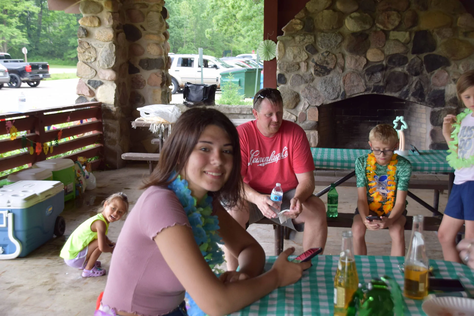Photos of food, happenings, staff and family during the company picnic event