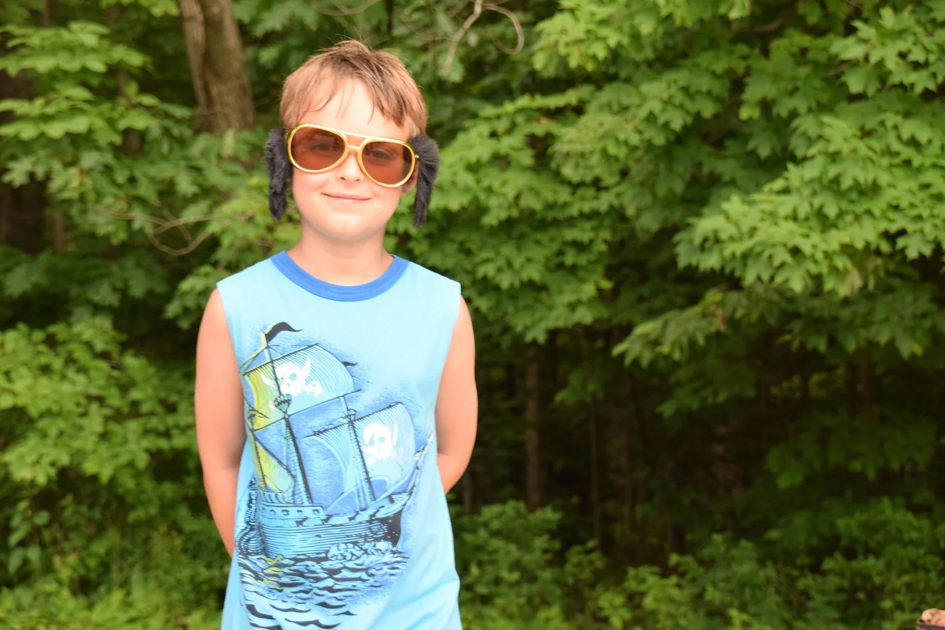 Photos of food, happenings, staff and family during the company picnic event
